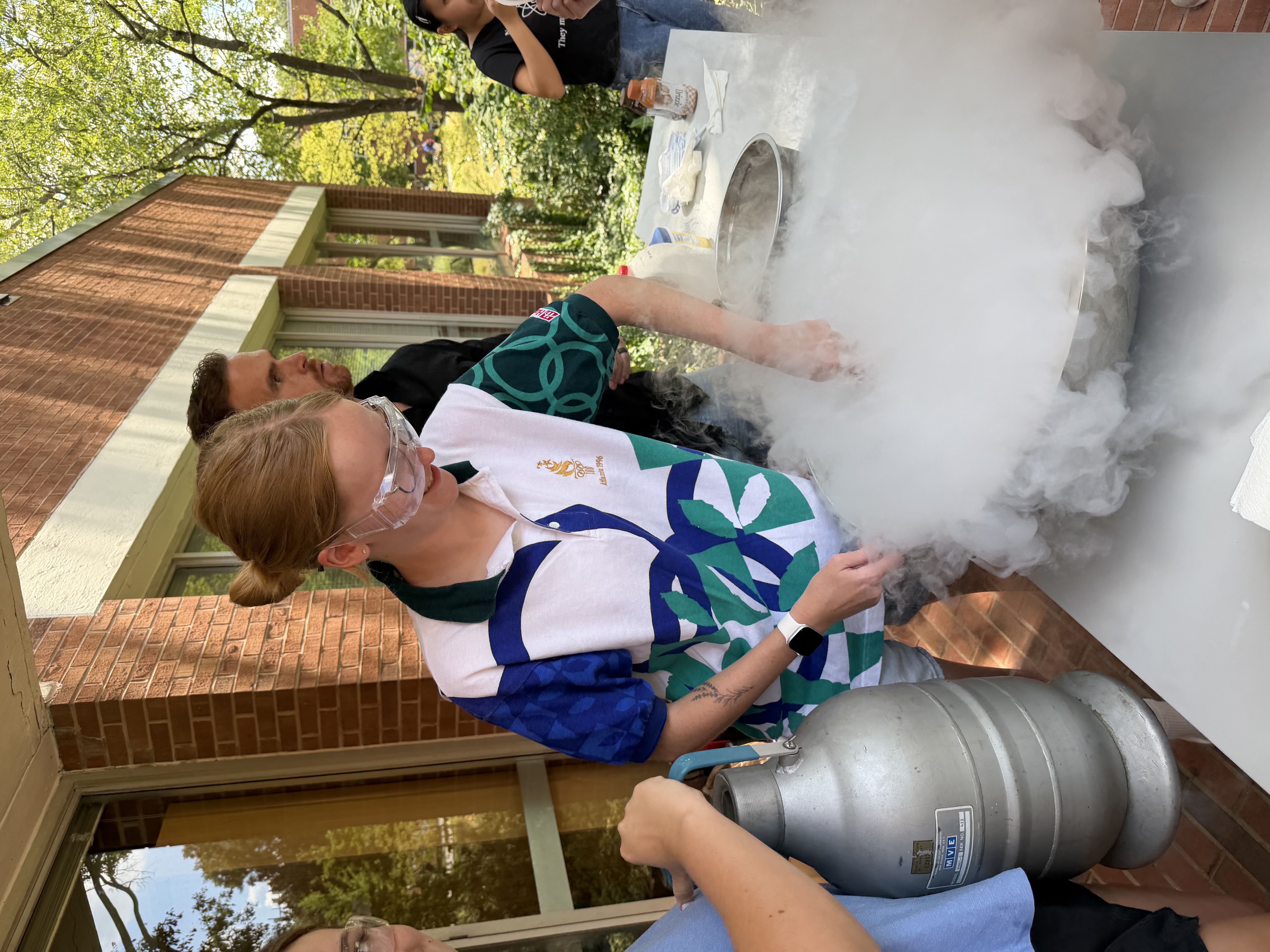 SAACS officers prepare liquid nitrogen ice cream during an event.