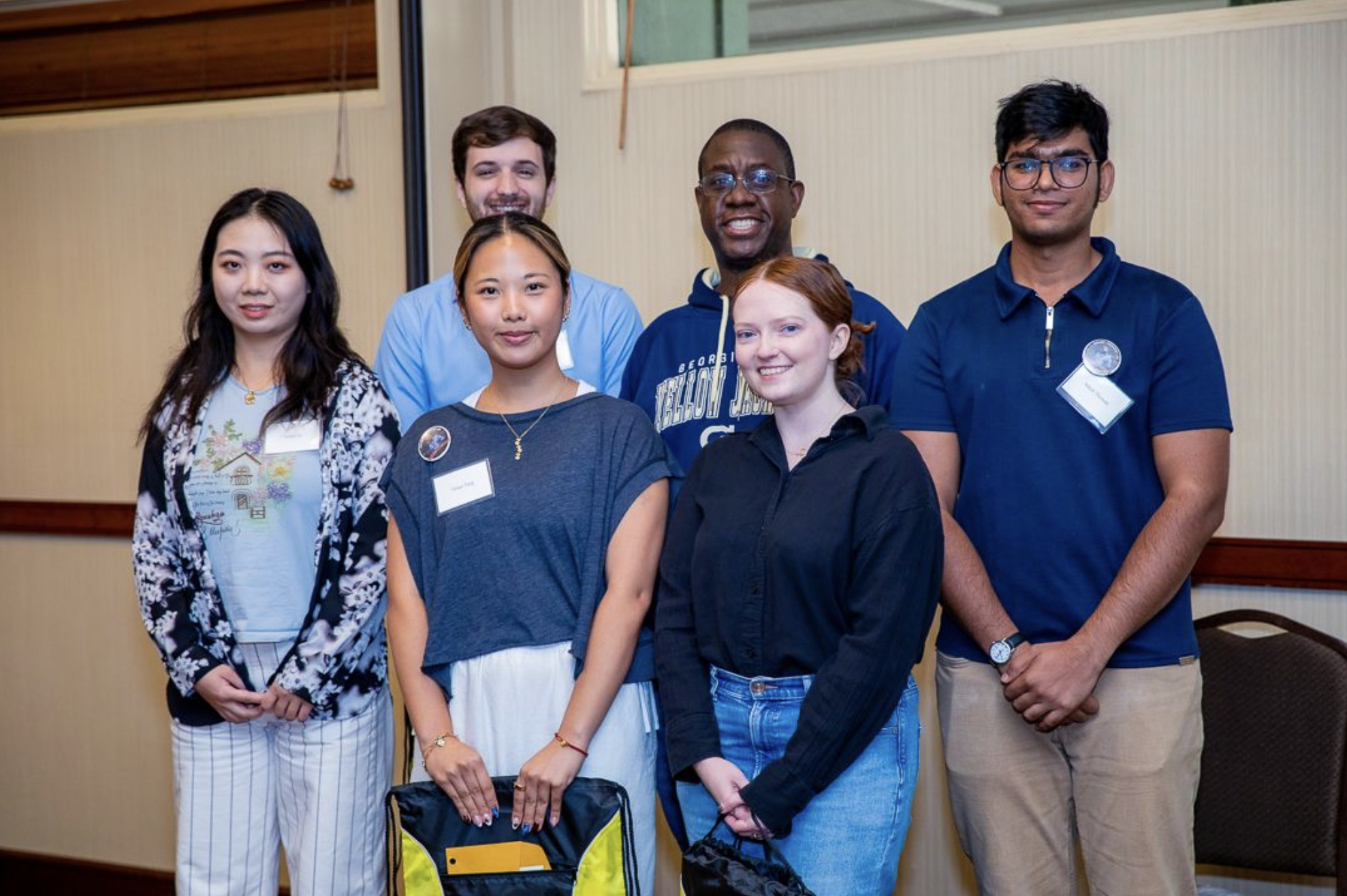 Poster and talk award winners pose with Stefan France.